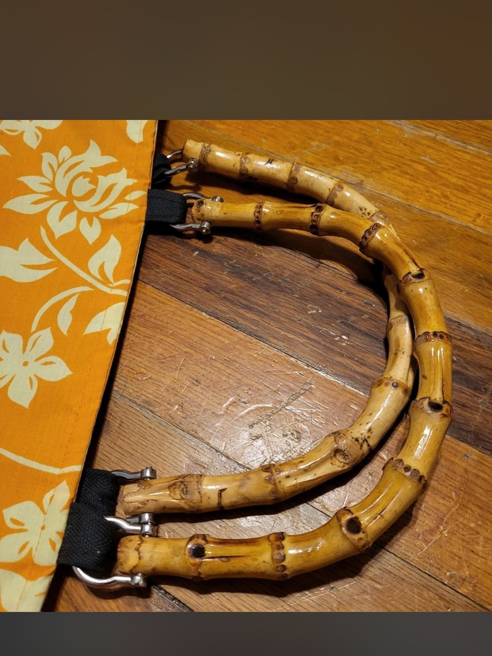 Orange floral vintage bag with bamboo handles